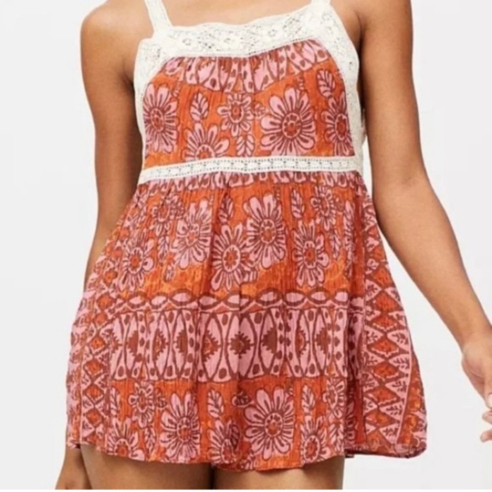urban outfitters floral romper with pockets size small
